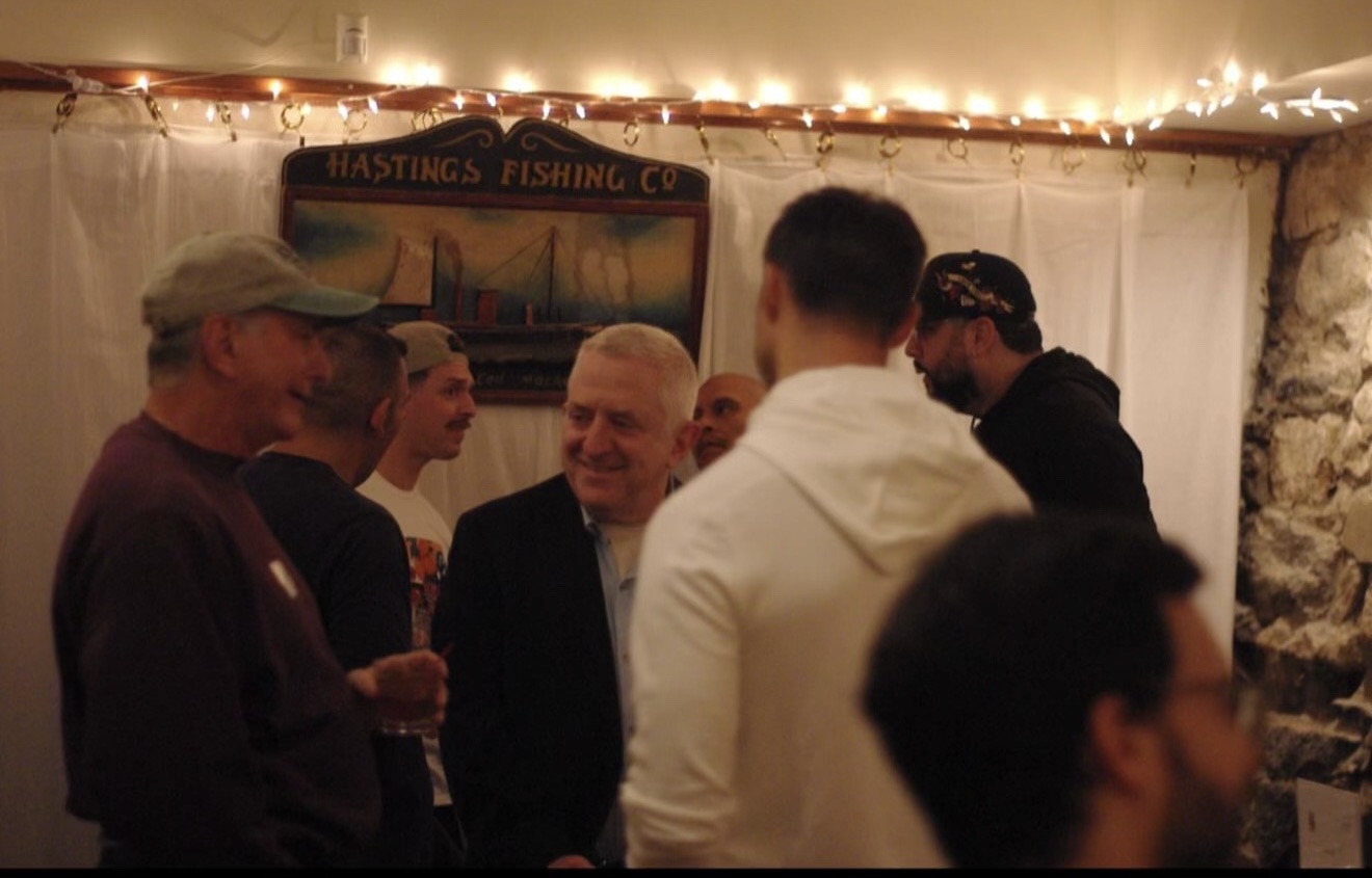 Dads catching up at an indoor gathering